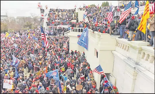  ?? Picture: REUTERS/STEPHANIE KEITH ?? Supporters of US President Donald Trump storm the US Capitol Building in Washington.