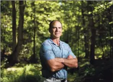  ?? Tyler Sizemore / Hearst Connecticu­t Media ?? Merrill Lynch Wealth Management client Tony Champion stands outside his home in Stamford on June 24.