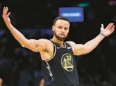  ?? ELSA/GETTY ?? Warriors’ Stephen Curry celebrates in the third quarter of Friday’s Game 4 matchup against the Celtics at TD Garden in Boston, Massachuse­tts.