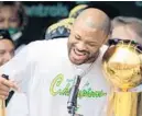  ?? AARON GASH/AP ?? Heat forward P.J. Tucker exulted and then was exiled by the Bucks after Milwaukee’s 2021 NBA title.