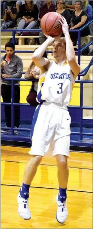  ?? Photo by Mike Eckels ?? Decatur’s Taylor Haisman puts up a long jumper from the wing during the Bulldog-Pioneer game at Peterson Gym in Decatur on Nov. 22. Haisman was the leading scorer for the Bulldogs, scoring 25 points, including five three-point shots for his second...