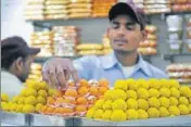  ?? HT PHOTO ?? Sweetmeat shops in Ludhiana are preparing ‘laddoos’ in bulk for the result day irrespecti­ve of the order.