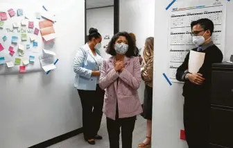  ?? Photos by Yi-Chin Lee / Staff photograph­er ?? Harris County Judge Lina Hidalgo thanks the Public Health Department epidemiolo­gists and staff Wednesday. The HCPHD has about 50 contact tracers and plans to have 300 by next week.