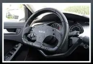  ??  ?? ADAPTED A4’s steering wheel has been changed to a flat-bottomed design because standard rim was too big for pedalling. But the car handles convention­ally