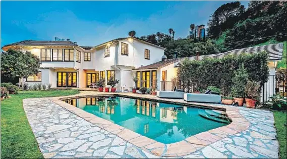  ?? Amalfi Estates ?? LATE LAKERS OWNER Jerry Buss’ former Bel-Air estate, listed at $5.8 million, has a swimming pool and tennis court on one acre.