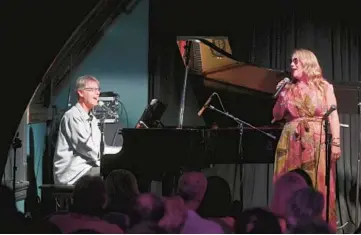  ?? VICTOR HILITSKI/PHOTOS FOR THE CHICAGO TRIBUNE ?? Singer Anne Burnell performs live Aug. 17 with husband and pianist Mark Burnell at the Epiphany Center for the Arts in Chicago. The couple has a new album,“Two for the Road.”