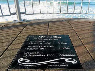  ??  ?? A plaque at St Clair commemorat­es Leslie Jordan, William (Bill) Black and Graeme Hitt, who were all killed in shark attacks.