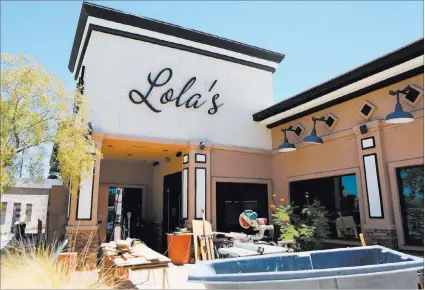  ?? RONDA CHURCHILL/ LAS VEGAS REVIEW-JOURNAL ?? Constructi­on continues at Lola’s Louisiana Kitchen, at 1220 N. Town Center Drive in Las Vegas. The restaurant will open at the end of August.