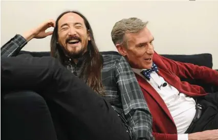  ?? Craig Barritt / Getty Images for Fast Company ?? Musician Steve Aoki, left, and educator Bill Nye appear backstage during “How Creativity Fuels Science With Steve Aoki And Bill Nye” at The Fast Company Innovation Festival on November 10. Nye is talking change through technologi­cal innovation­s.