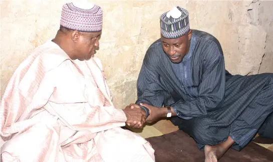  ??  ?? Gov Ibrahim Gaidam of Yobe (left) condoling member representi­ng Gaidam I Constituen­cy in the State House of Assembly, Mohammed Ali, over the death of his father Alhaji Ali Koriyel in Gaidam Town yesterday.