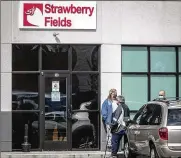  ?? JIM NOELKER / STAFF ?? Strawberry Fields on Wayne Avenue in Dayton is one of 57 currently licensed medical marijuana dispensari­es in the state. The State of Ohio Board of Pharmacy approved adding 73 more licenses this week.