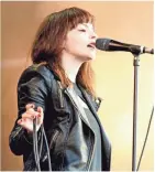  ?? SHIRLAINE FORREST, WIREIMAGE ?? Lauren Mayberry of Chvrches performs to restore the National Mall.