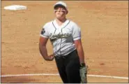  ?? NICK TOPPING — NTOPPING@DIGITALFIR­STMEDIA.COM ?? Isabelle DeChiaro winds up for a pitch during Cohoes' 12-1 win over Saranac Thursday at Plattsburg­h State. DeChiaro hit for the cycle with a single, two doubles, a triple and a homerun, while also throwing seven solid innings for the Tigers.