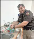  ?? Contribute­d by Blair elrod ?? Polk County Sheriff’s Office Deputy Chief Jonathan Blackmon, who is also a chamber board member, volunteere­d to help with the cooking at the annual Member Appreciati­on Breakfast in Rockmart on Jan. 24.