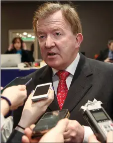  ??  ?? A deflated John Perry talks to reporters on Sunday about losing his seat as a sitting Fine Gael TD. Pics Carl Brennan
