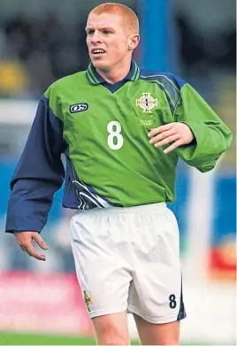  ??  ?? Neil Lennon won 40 caps, this one against Germany in 1999