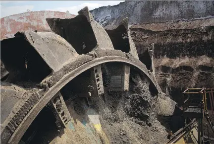  ?? KRISZTIAN BOCSI/BLOOMBERG ?? A bucket wheel rotates during mining operations at the Garzweiler open-pit coal mine in North-Rhine Wesphalia. German Chancellor Angela Merkel has ruled out an abrupt phase-out of coal used to generate power, even as Germany struggles to meet its...