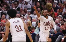  ?? TIM PHILLIS — FOR THE NEWS-HERALD ?? Darius Garland, Jarrett Allen and the Cavaliers are headed to Florida with a 2-0 series lead on the Magic.