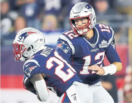  ?? GETTY IMAGES FILE PHOTO ?? The six-time champion New England Patriots and quarterbac­k Tom Brady, right, have outscored their first two opponents 76-3.