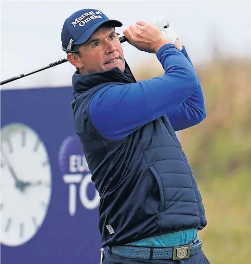  ??  ?? Above: Padraig Harrington on the 10th tee during his round of 69 yesterday; left: co-leader Adrian Otaegui contemplat­es a putt; Matt Wallace, who shares the lead after a 67, discusses a tricky position with his caddie.