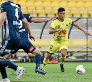  ?? GETTY IMAGES ?? Ulises Da´vila, pictured in action against Melbourne Victory, and Gary Hooper are the only members of the Wellington Phoenix squad who are not in New Zealand at the moment.