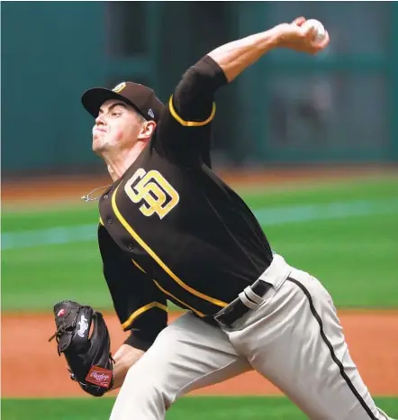  ?? K.C. ALFRED U-T ?? Padres left-hander MacKenzie Gore throws against the Rangers on Thursday in Surprise, Ariz. He pitched 12⁄3 scoreless innings.