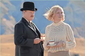  ?? NETFLIX ?? George (Jesse Plemons, left) falls for the widow Rose (Kirsten Dunst) in Netflix drama “The Power of the Dog,” which leads the 2022 Oscar nomination­s.