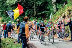  ??  ?? When the Tour crossed the Mur de Péguère in 2012, the biggest challenge to the riders was the spate of punctures caused by what was presumed to be a disgruntle­d local spreading tacks.
The yellow jersey group ascends the Péguère in 2012