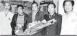  ??  ?? During the operation, Mr Yang lost so much blood he had to be given four adults worth in transfusio­ns. He is pictured (centre) with his doctors and his father (second from the left)