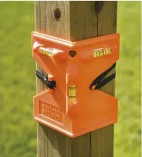 ??  ?? A posthole level (above right) is an inexpensiv­e and must-have tool for building fences properly.