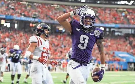  ?? DALE ZANINE, USA TODAY SPORTS ?? “I just try to keep the same mentality of a dude that had to work for a scholarshi­p here,” says TCU wideout Josh Doctson, right.