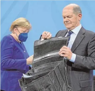  ?? // REUTERS ?? Olaf Scholz toma el relevo de Angela Merkel