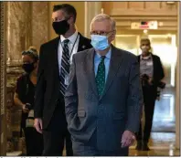  ??  ?? Senate Majority Leader Mitch McConnell leaves the Senate floor Wednesday after a $500 billion GOP stimulus bill fell short of the 60 votes needed to advance it. (The New York Times/Samuel Corum)