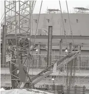  ?? Chuck Burton / Associated Press file ?? The V.C. Summer Nuclear Station near Jenkinsvil­le, S.C. South Carolina’s utilities are abandoning two partly built nuclear reactors.