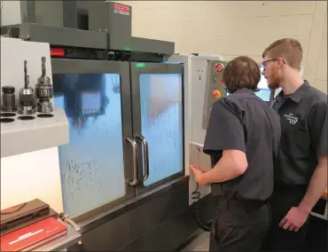  ?? DAVID MEKEEL —MEDIANEWS GROUP ?? Dylan Arndt, a senior at Berks Career and Technology Center, works on a project for NASA in the school’s computeriz­ed machining shop.