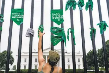  ?? Kent Nishimura Los Angeles Times ?? ABORTION RIGHTS activists protest outside the White House this month. The Supreme Court’s decision to overturn Roe vs. Wade has pushed abortion way up the list of leading voter concerns, recent surveys show.