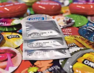  ?? AFP PIC ?? Nasi lemak-flavoured condoms made by Karex Industries seen at its headquarte­rs in Port Klang recently.