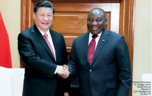  ??  ?? Chinese President xi Jinping meets South African President Cyril Ramaphosa on July 24