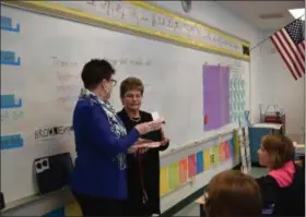  ?? MARIAN DENNIS — MEDIANEWS GROUP ?? Alison Moyer with the Foundation for Boyertown Education, makes a visit to one of several classrooms Thursday to present a grant check for school projects.