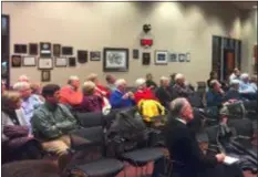  ?? LINDA STEIN - MEDIANEWS GROUP ?? Radnor residents listen intently at a community developmen­t committee meeting about a proposed new Wawa.