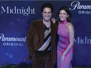  ?? BERENICE BAUTISTA — THE ASSOCIATED PRESS ?? Diego Boneta and Tamalpais High School alumna Monica Barbaro pose on the red carpet at the “At Midnight” premiere in Mexico City.