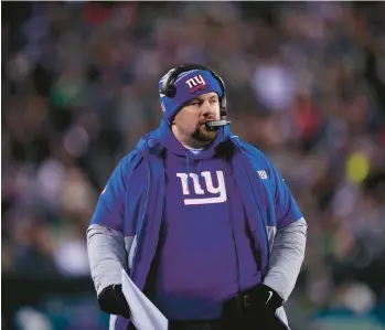  ?? MATT ROURKE/AP ?? Giants head coach Brian Daboll walks the sideline Sunday in Philadelph­ia.