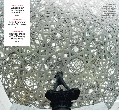  ??  ?? The Louvre Abu Dhabi’s dome rises above Walking Man, On a Column, a bronze sculpture of Auguste Rodin by Fonderie Coubertins.