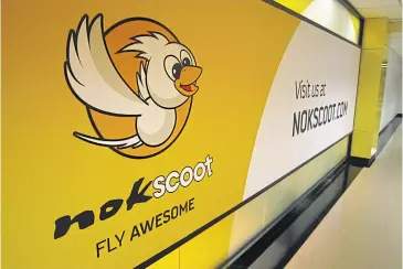  ?? BANGKOK POST ?? NokScoot’s office at Don Mueang airport. After a revenue surge in 2019, the low-cost carrier has been hit hard by the ongoing coronaviru­s pandemic.