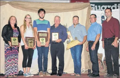  ?? ALYSHA CAMPBELL/JOURNAL PIONEER ?? Award winners at the O’Leary Potato Blossom Festival Farmers’ Awards banquet included: Melissa Clements (left), Emma Jean Griffin, Colton Griffin, Jeff Smallman, Morgan Smallman, Jason Smallman and Jimmy McAssey.