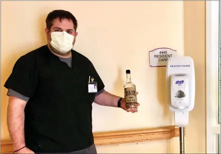  ?? SUBMITTED PHOTO ?? Staff members at Kendal-Crosslands retirement complex display hand sanitizers that have been in use since the pandemic began in early March.