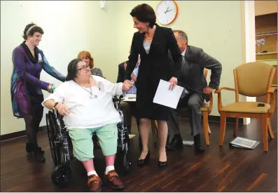  ?? Ernest A. Brown photo ?? Gov. Gina Raimondo thanks senior services advocate Pat Peloquin, left, after Peloquin introduced her at an event at PACE Rhode Island in Woonsocket Friday, where Raimondo announced a series of round-table sessions throughout the state discussing more...