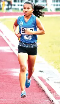  ?? ACE JUNE RELL S. PEREZ ?? FIRST GOLD. Kim Andrada Villaruz of Western Visayas races in the secondary girls 3,000-meter event to win the first gold medal of the National Prisaa Games 2019 at the University of Mindanao (UM) track oval in Matina, Davao City yesterday.