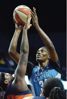  ?? Sean D. Elliot/ The Day via AP ?? Minnesota Lynx’s Sylvia Fowles is fouled by Connecticu­t Sun’s Lynetta Kizer in the second half of a WNBA game May 26 in Uncasville, Conn. The top three scorers in the WNBA are all post players: Fowles, Phoenix’s Brittney Griner and New York’s Tina...