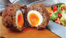  ?? ALAMY ?? No yolk: A Scotch egg may still count as a substantia­l meal